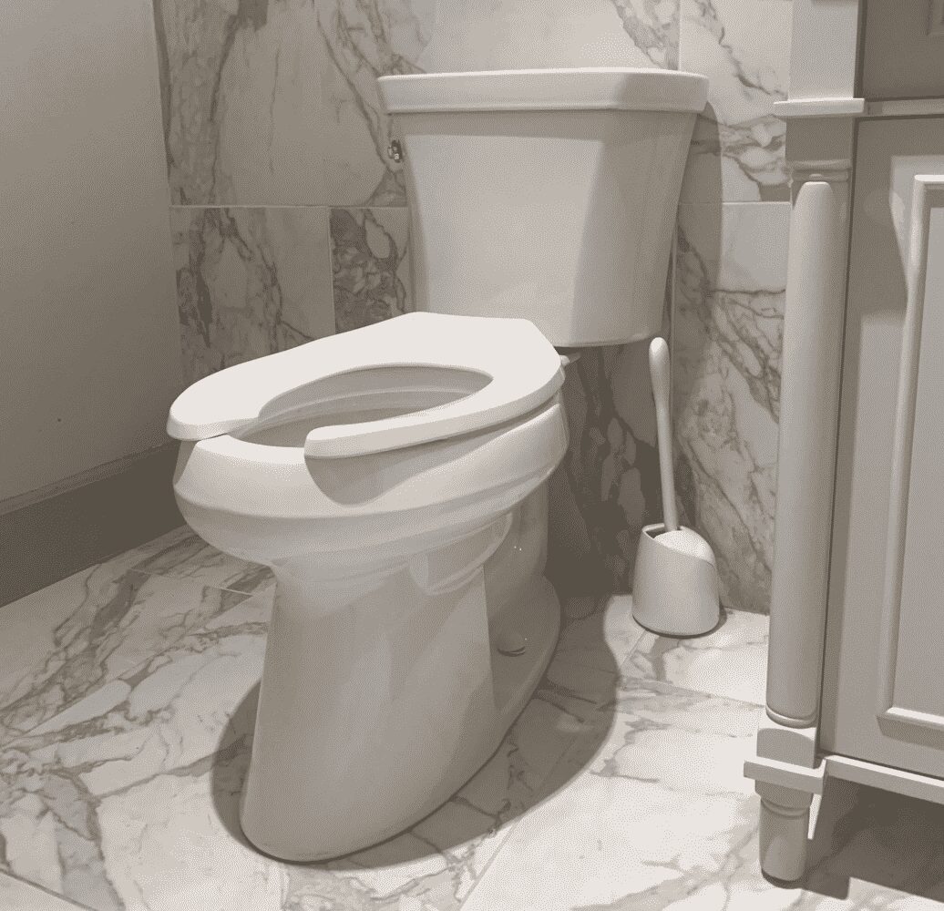 White Toilet in Bathroom with Marble Flooor