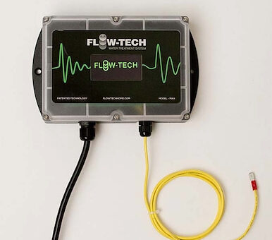Flow Tech is a descaling device that sends out a low voltage radio frequency to break down sediment in lines without softening