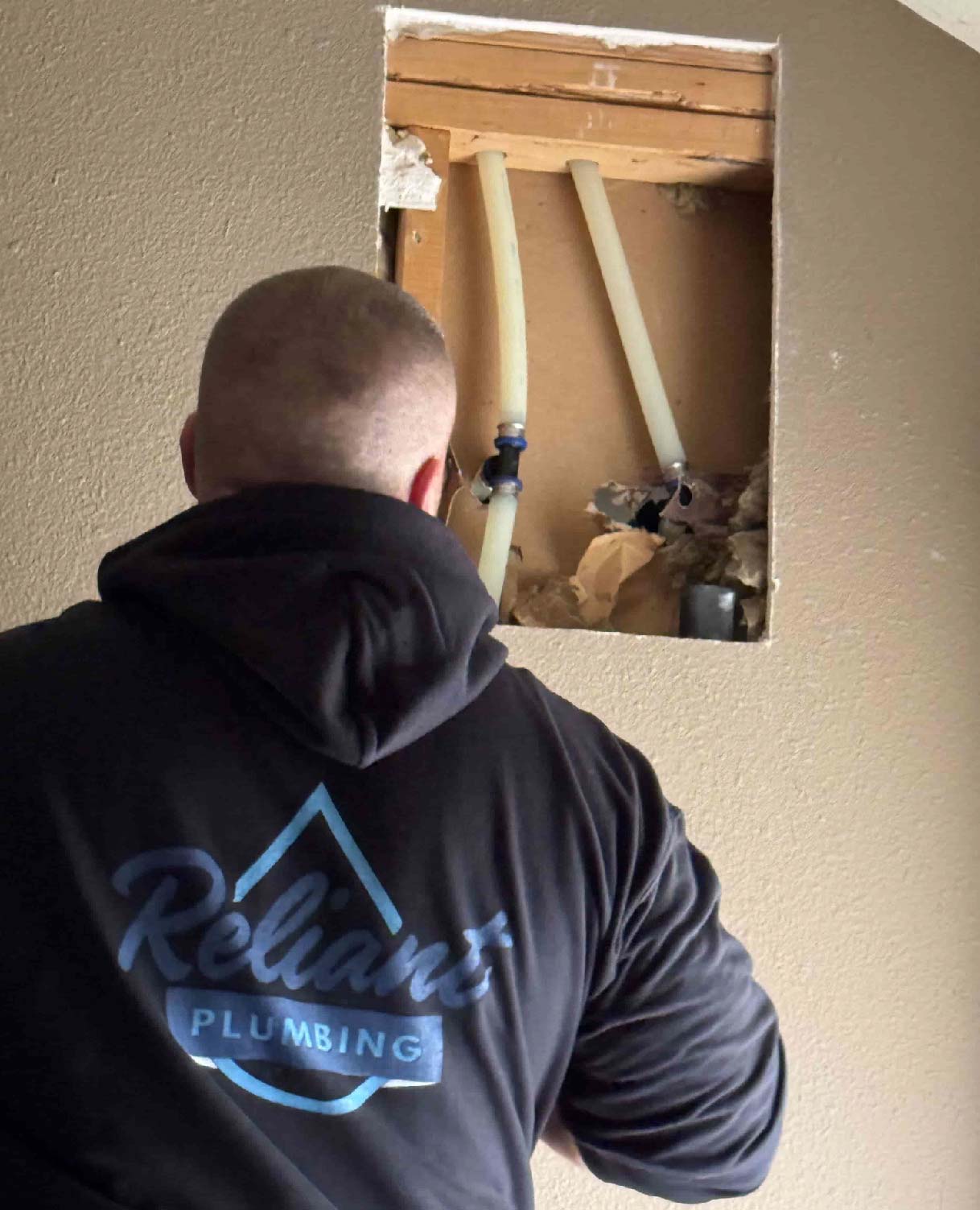 Reliant plumbing ceo max hicks repairing a home that flooded. a whole house repipe was necessary to repair the home.