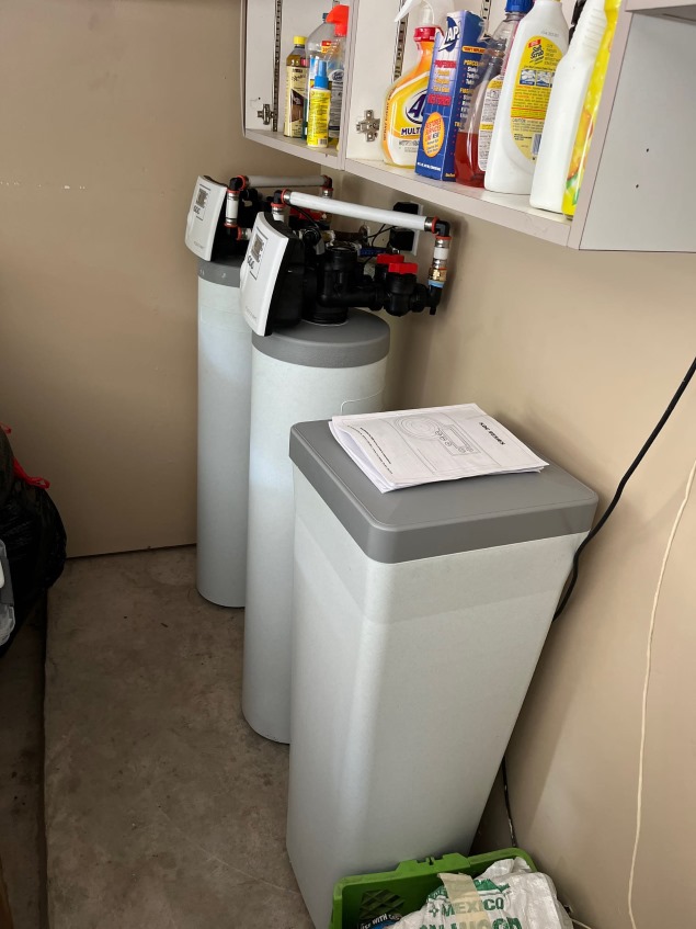 Nugen water softener installation in residential garage